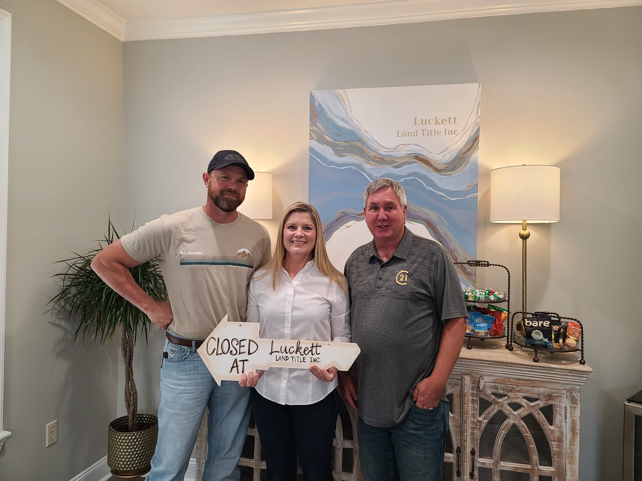 Jeff Palmer and clients at a closing